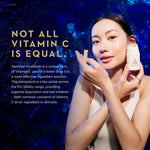 A woman holds a small white skincare bottle against a dark blue textured background, with large gold and white text on the left reading 'NOT ALL VITAMIN C IS EQUAL.' and descriptive copy about Ascorbyl Gluconide.