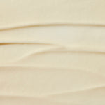 Manuka Health Pro Vitality Hand Cream swatch with wavy pattern.
