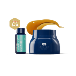 Blue bottle labeled 'Immunity Elixir' and blue jar labeled 'Manuka Honey' on a green background