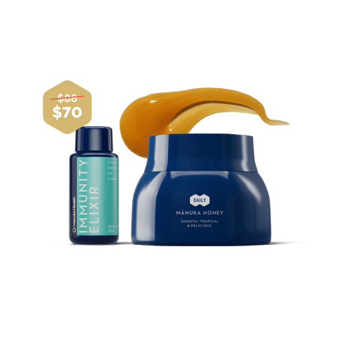 Blue bottle labeled 'Immunity Elixir' and blue jar labeled 'Manuka Honey' on a green background