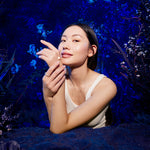 Women applying Pro Vitality Hand Cream . 